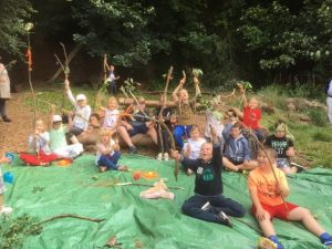 Children with their journey sticks they made during a forest school session